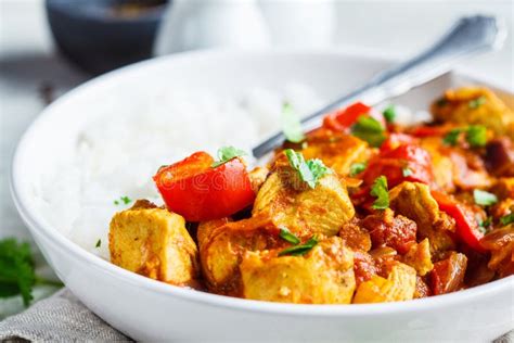 Jalfrezi Chicken with Rice in White Bowl. Traditional Indian Cuisine Concept Stock Photo - Image ...