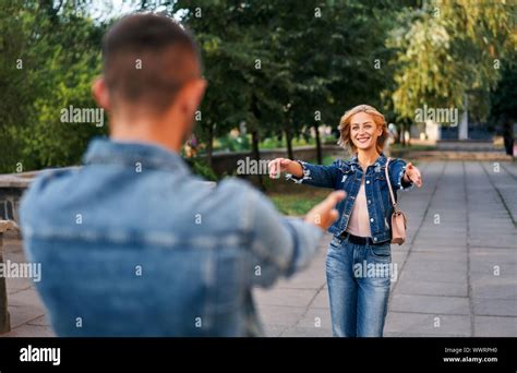 Two lovers hugging each other hi-res stock photography and images - Alamy