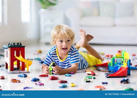 Kids Play with Toy Cars. Children Playing Car Toys Stock Image - Image of drive, family: 145779563