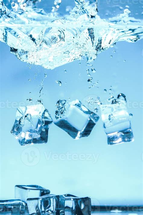 Abstract background image of ice cubes in blue water. 7643569 Stock ...