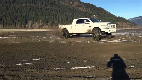 Lifted diesel trucks mudding - YouTube