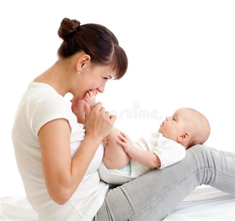 Cute Joyful Mother Kissing Her Baby Infant Stock Photo - Image of ...