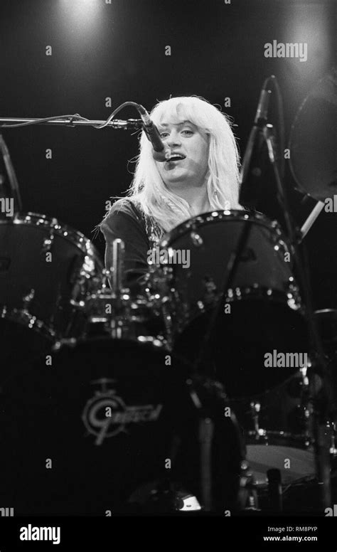 Bangles drummer Debbi Peterson is shown performing onstage Stock Photo ...