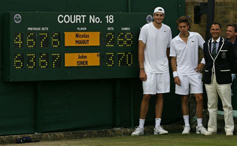 John Isner of the US , France's Nicolas Mahut , and chair umpire... | Tennis match, Wimbledon ...