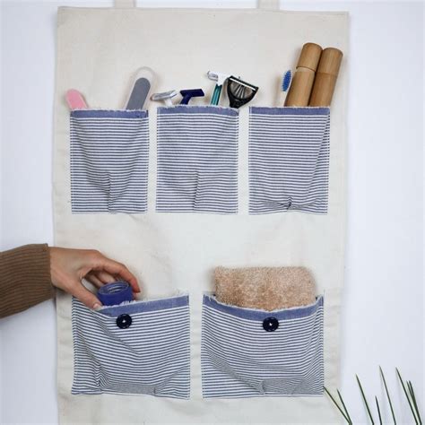 DIY Hanging Organizer with Pockets - Craftsy Hacks