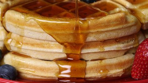 Picture of Pouring Maple Syrup On Waffles - Free Stock Photo