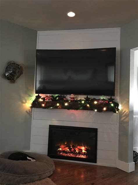 Shiplap corner fireplace with TV above. | Corner fireplace, Fireplace remodel, Corner gas fireplace