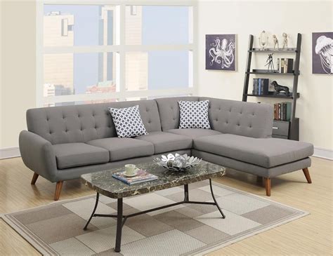 $549....Great looking sectional with tufted backs, accent pillows and ...