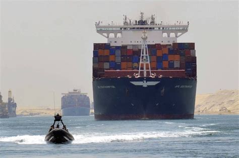 First Cargo Ships Take Trial-Run Through New Suez Canal