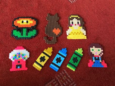 Hama Beads Super Mario Sunflower, Cat, Belle, Gumball Machine, Crayons ...