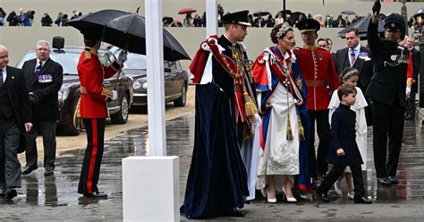 Kate Middleton forced to hitch up Coronation dress due to rain as she ditches tiara - Irish ...