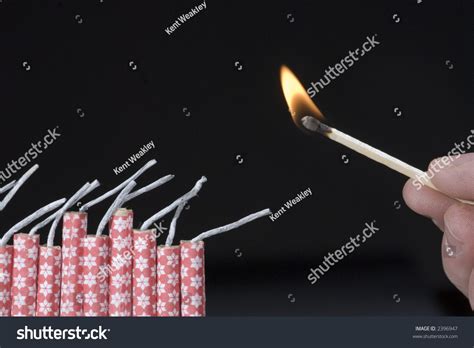 Fireworks Lit With Flame Of Match 03 Stock Photo 2396947 : Shutterstock