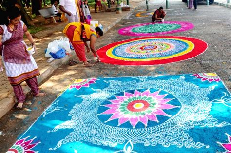 Women participate in Rangoli competition on Kannada Rajyotsava