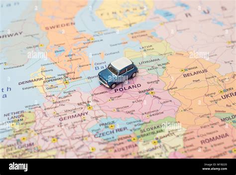 Concept of Europe car trip. Car is on the map in Poland Stock Photo - Alamy