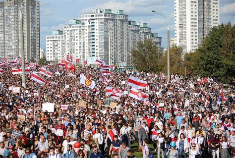 At least 100,000 Belarus protesters flood streets to demand end of ...