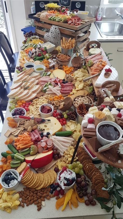 Grazing table bridal shower #thegrazingtblelady | Party food platters, Grazing tables, Food platters