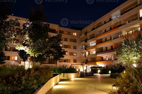 Exterior of apartment building at night 27852702 Stock Photo at Vecteezy