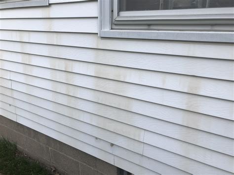 How do I remove these stains from my aluminum siding? They are under ...