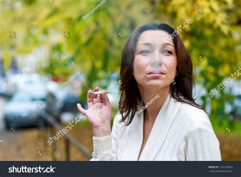 Attractive Mature Woman Smoking Cigarette Park Stock Photo 160134509 | Shutterstock