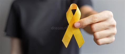 Childhood Cancer Awareness, Yellow Ribbon with Stethoscope for Supporting People Living Stock ...