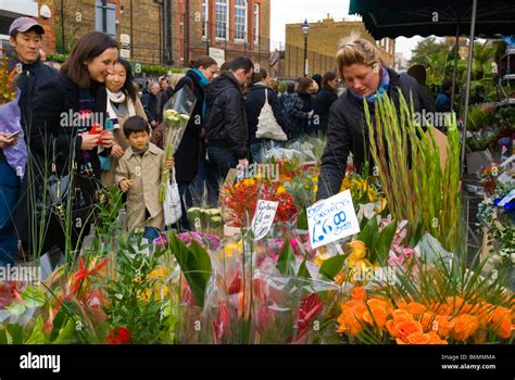 Columbia Road flower market during the Sunday market day in East London ...