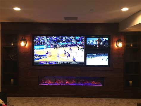 Multi TV setup in finished basement mancave | Man cave home bar, Man cave tv wall, Basement ...