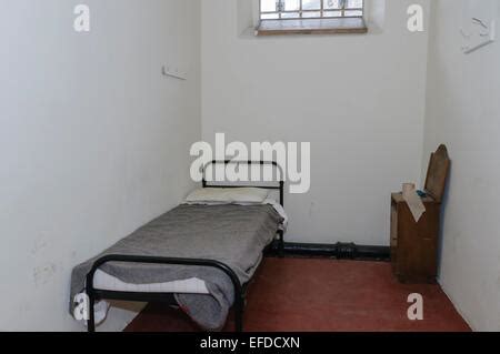 Bed in a small jail cell Stock Photo: 78356847 - Alamy