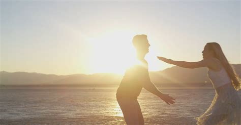 Couple Dancing On Sunset Background · Free Stock Video