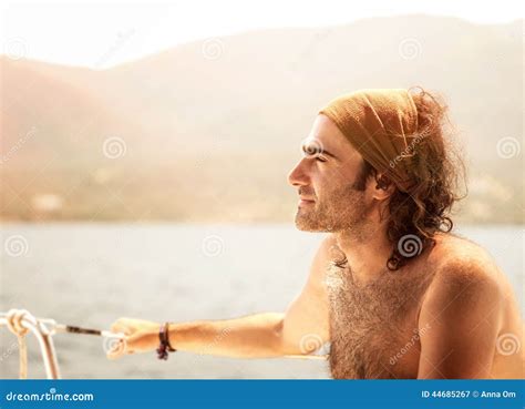 Handsome man on the yacht stock image. Image of boating - 44685267