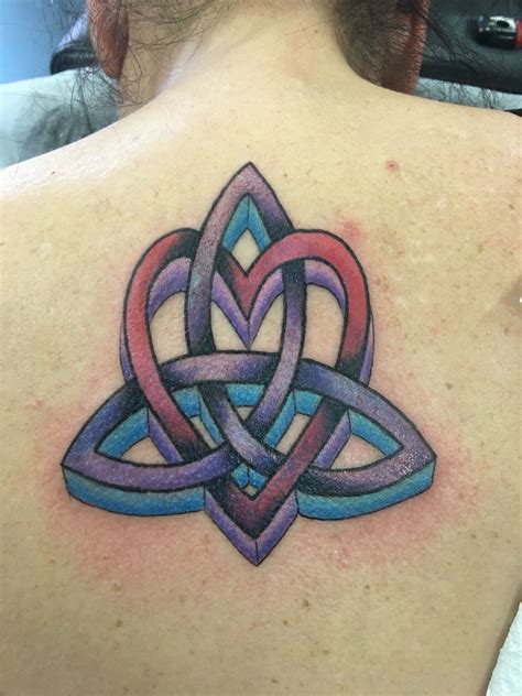 Branded Celtic love knot tattoo | Knot tattoo, Trinity knot tattoo ...