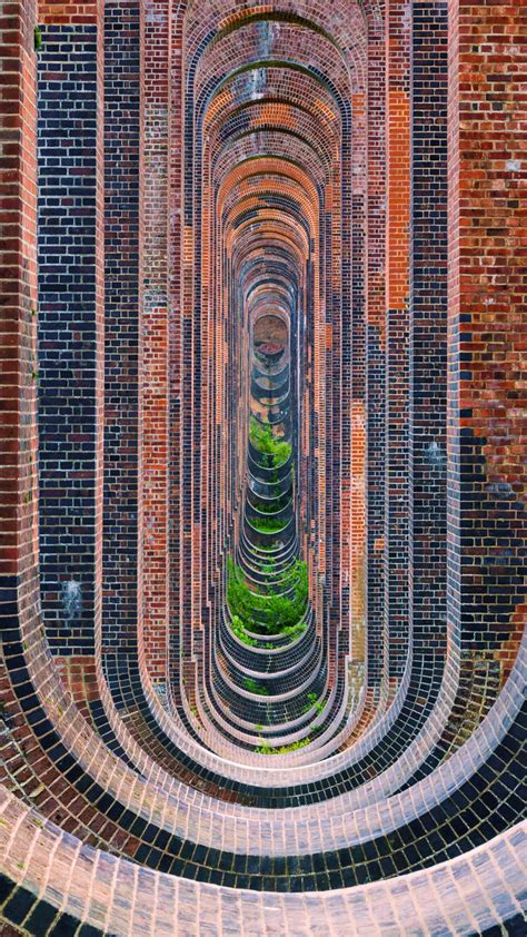 Under the railway Ouse Valley Viaduct on the River Ouse, Balcombe, West ...