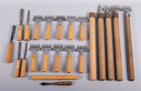 Lot - ARTISAN WOOD AND STEEL ICE SCULPTING CARVING TOOLS, 20TH CENTURY