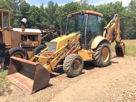 New Holland 4WD 555E Extendahoe backhoe $20'000 SOLD! - United Exchange USA