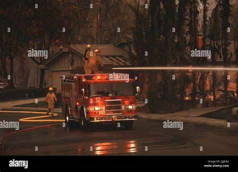 San Diego Fire-Rescue Engine 12's crew douses hot spots at the Cedar ...