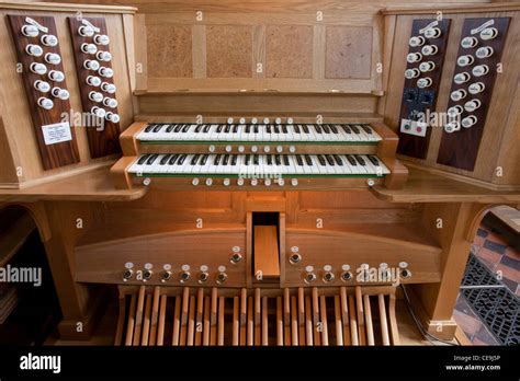 Organ console by Renatus for the newly restored Bevington pipe organ Stock Photo, Royalty Free ...