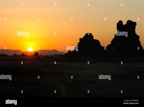 Sunset over limestone chimneys in Lake Abbe in Djibouti, horn of Africa Stock Photo - Alamy