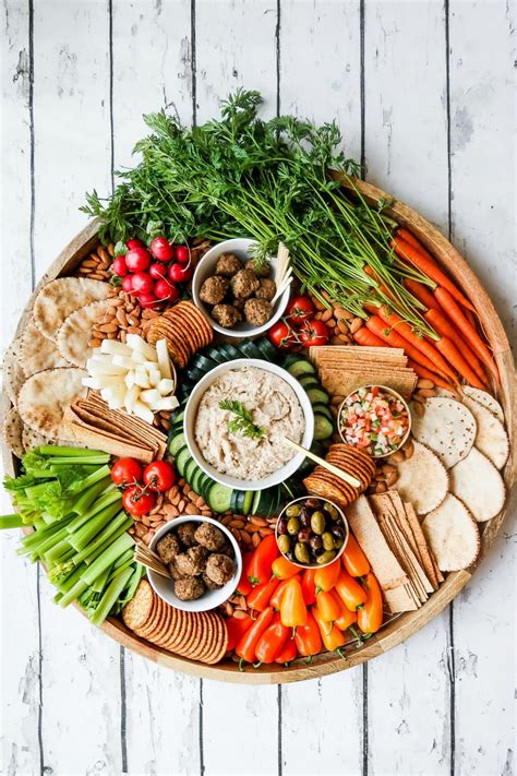 Epic Vegan Charcuterie Board with plant-based meatballs and cashew dip, and other delicious ...