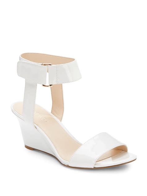 Nine West Riley Ankle-Strap Wedge Sandals in White - Lyst