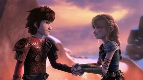 Hiccup and Astrid's moment of holding hands before they kiss from Dreamworks Dragons Race to t ...