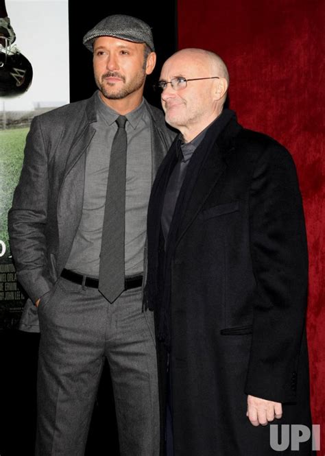 Photo: Tim McGraw and Phil Collins attend "The Blind Side" movie ...