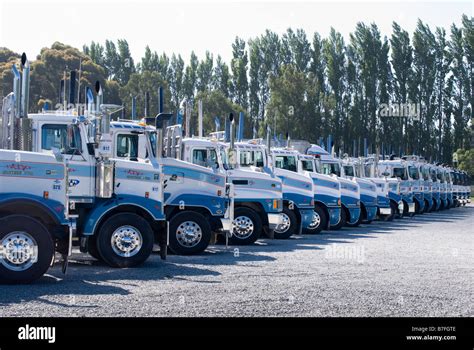 Modern fleet of log & bulk transport trucks, Main North Road, Kaiapoi, Canterbury, New Zealand ...