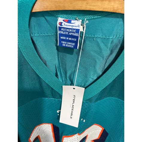 Vintage Miami Dolphins Champion Jersey Colour:... - Depop