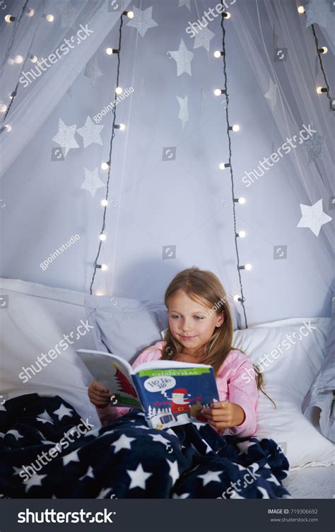 Girl Reading Book On Bed Stock Photo 719306692 | Shutterstock