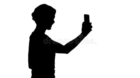 Silhouette Woman Holding Cell Phone Up Stock Photos - Free & Royalty-Free Stock Photos from ...