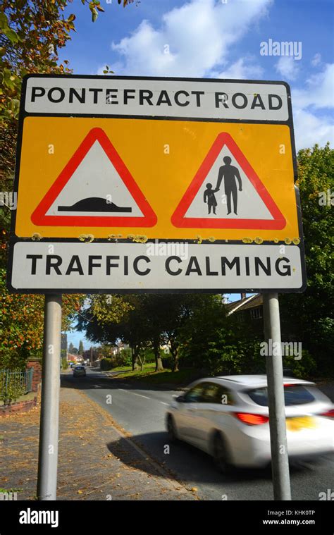 traffic calming warning sign of speed bumps and pedestrians in road ahead, pontefract road ...