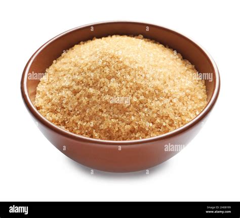 Bowl with brown sugar on white background Stock Photo - Alamy