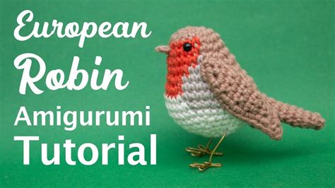 a small crocheted bird sitting on top of a green surface with the words ...