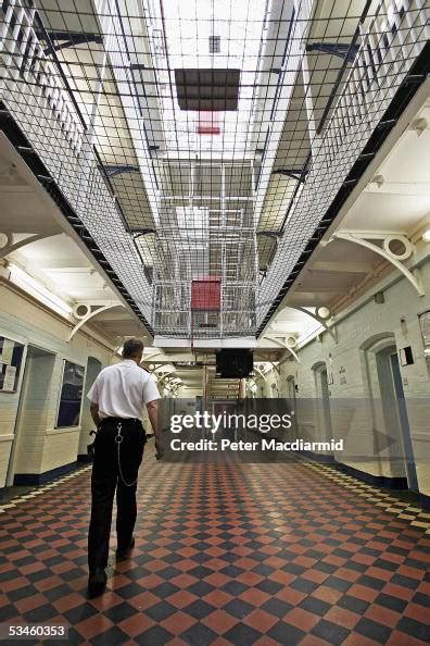 A prison officer walks through A Wing of Norwich Prison on August 25,... News Photo - Getty Images