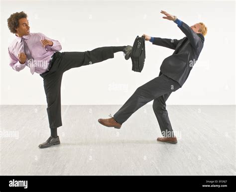 Two business people fighting Stock Photo, Royalty Free Image: 78123759 - Alamy