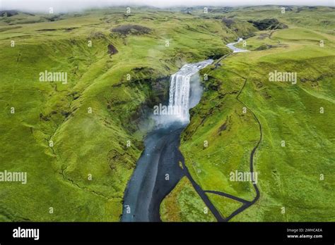 Aerial drone view of Skogafoss waterfall in Iceland, one of the most ...